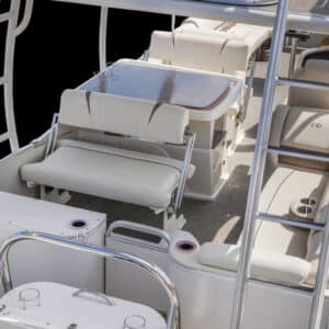 A view of the interior of a Catalina Cruise Funship showing padded bench seats, a table with cup holders, a steering area with a large dashboard, and polished metal handrails. The seating area has white upholstery, and there's a metal ladder leading to an upper level.