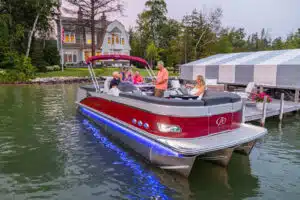 Family riding on 2022 Avalina Catalina Entertainer on a lake.