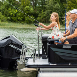 Family fishing off the back of an Avalon Venture 85