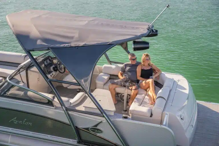 Couple cruising on an Avalon Catalina Platinum Elite