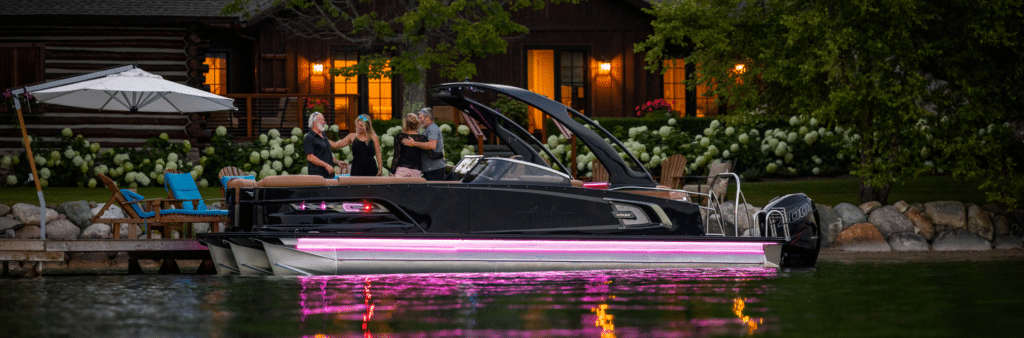An Avalon Pontoon Boat parked and old friends reunited together